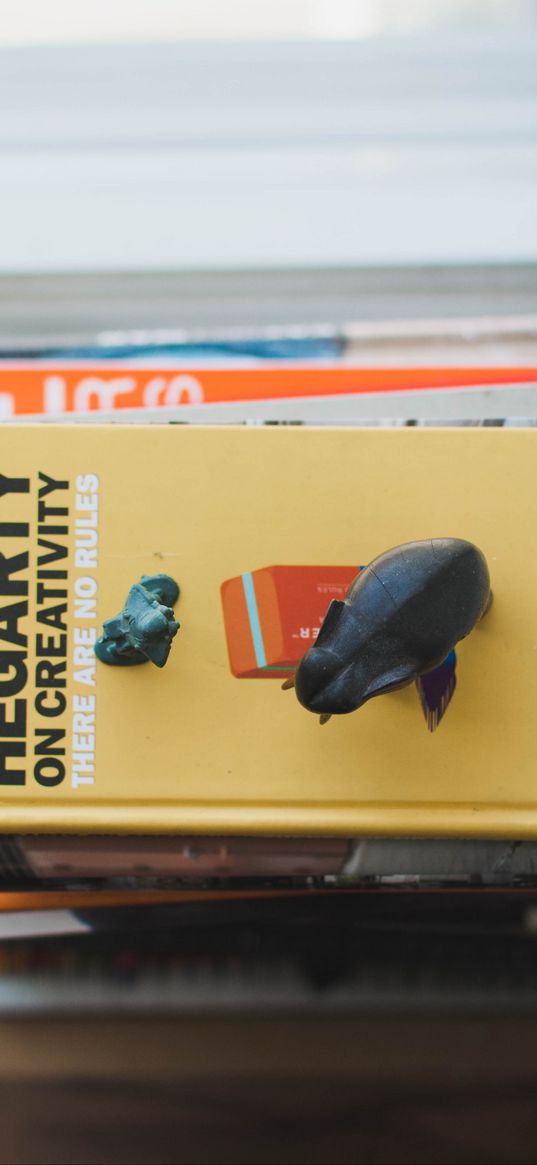 books, stack, figurines