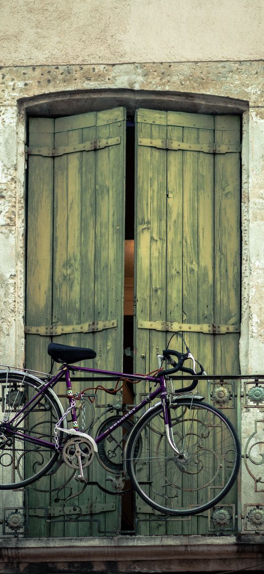 bicycle, balcony, door, wall