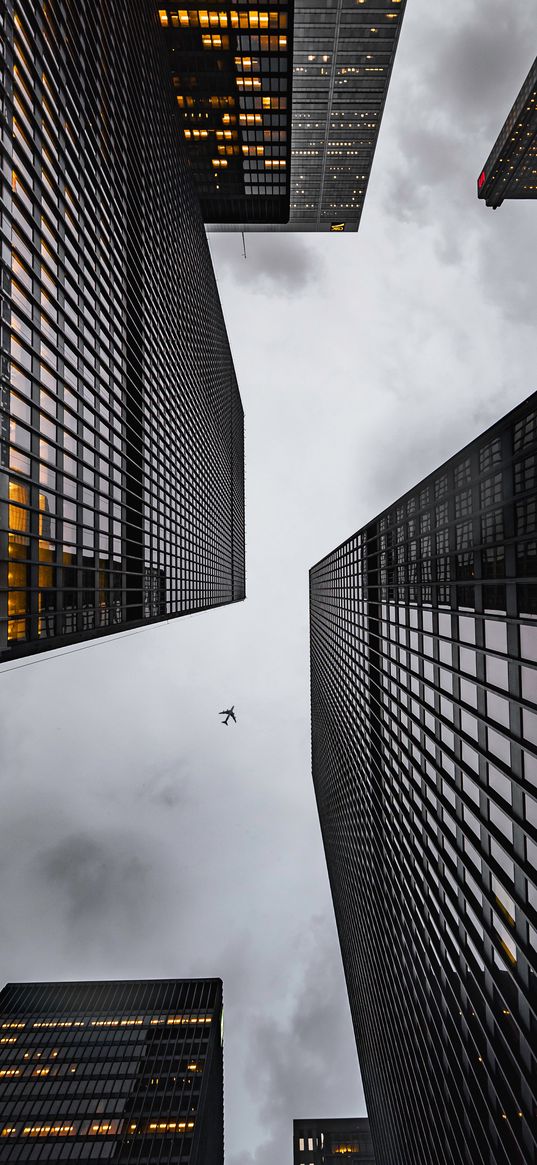 airplane, buildings, skyscrapers, bottom view