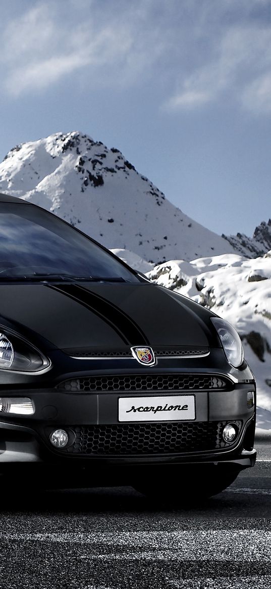 black, stylish car, side view of the mountains, abarth, scorpione