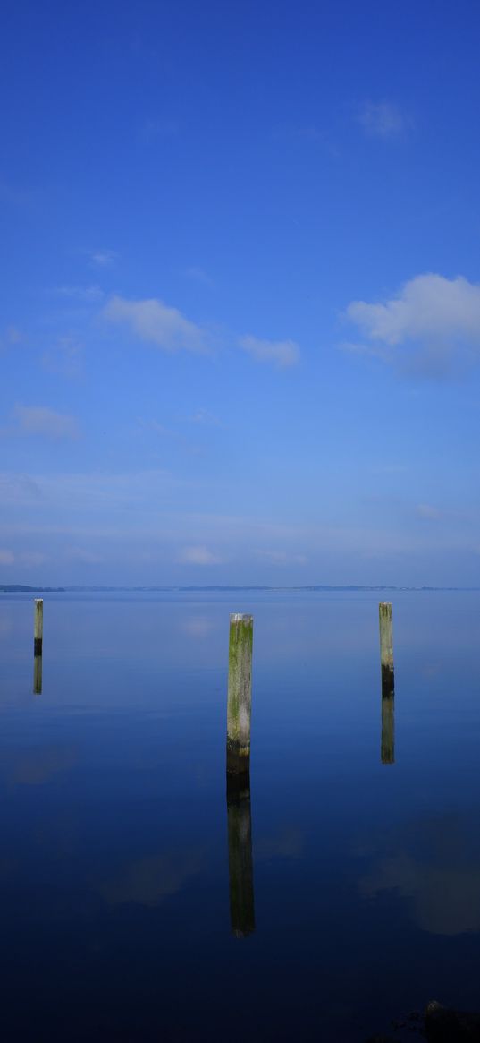 water, pillars, horizon, sky, reflection