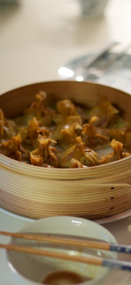 dumplings, sticks, plates, cooking