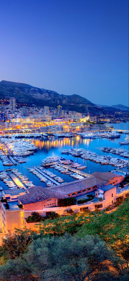 city, buildings, evening, embankment, boats, mountains, water