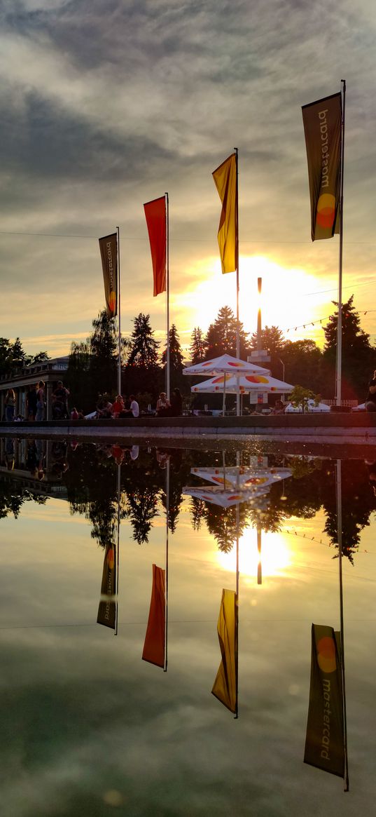 sunset, water, reflection, flags, clouds