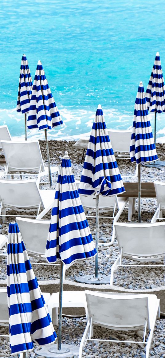 deck chairs, sunbeds, pebbles, sea, beach