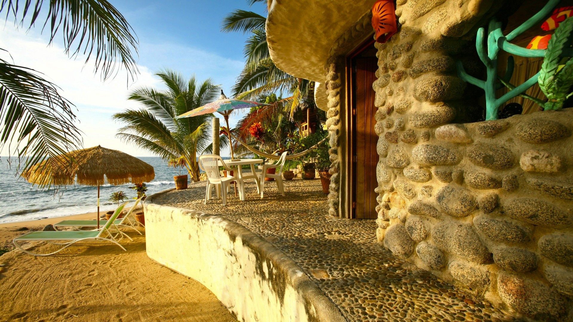 building, beach, sand, palm trees