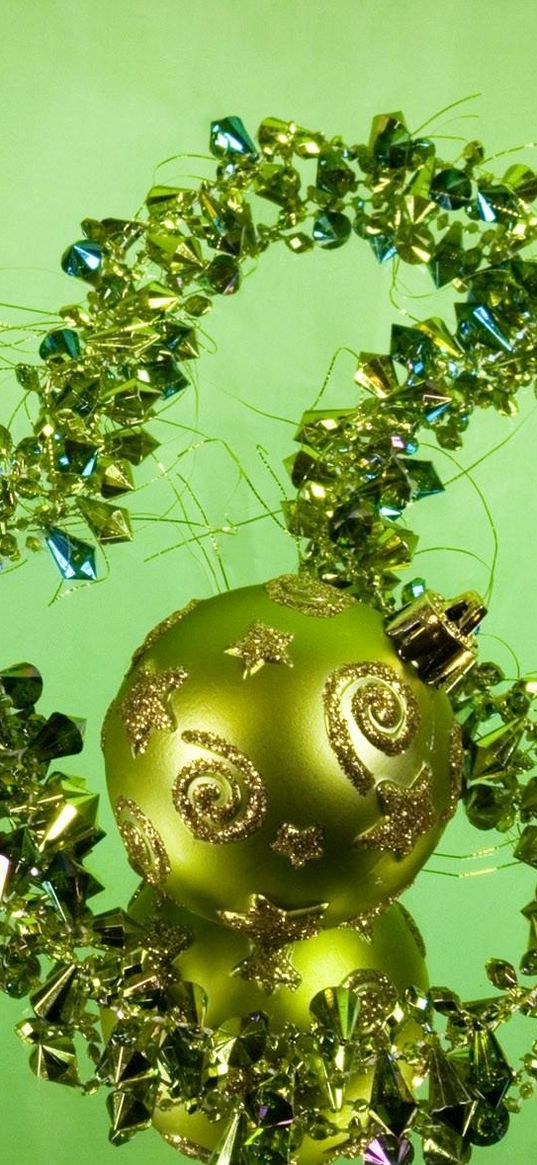 christmas decorations, balloon, stones, candle, candlestick, green background