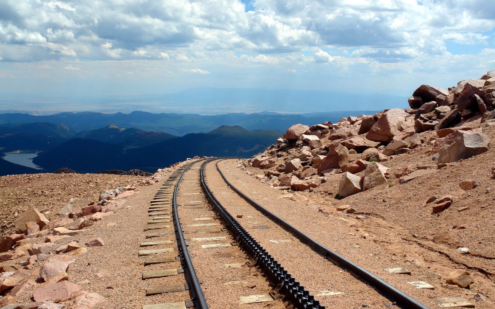 road, rails, cross ties, desert, stones, sand, day