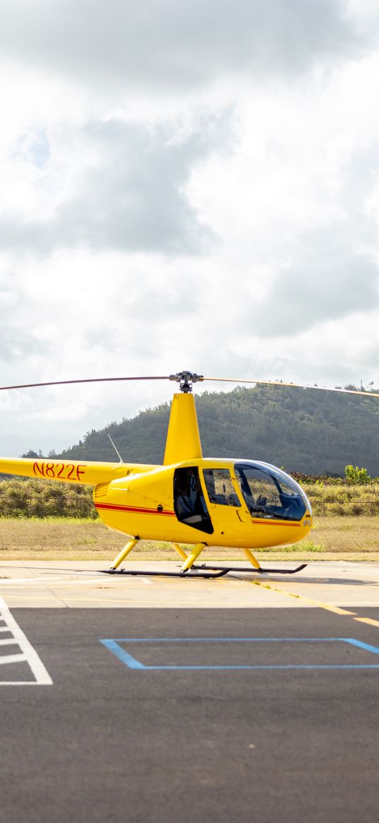 helicopter, yellow, asphalt, hill