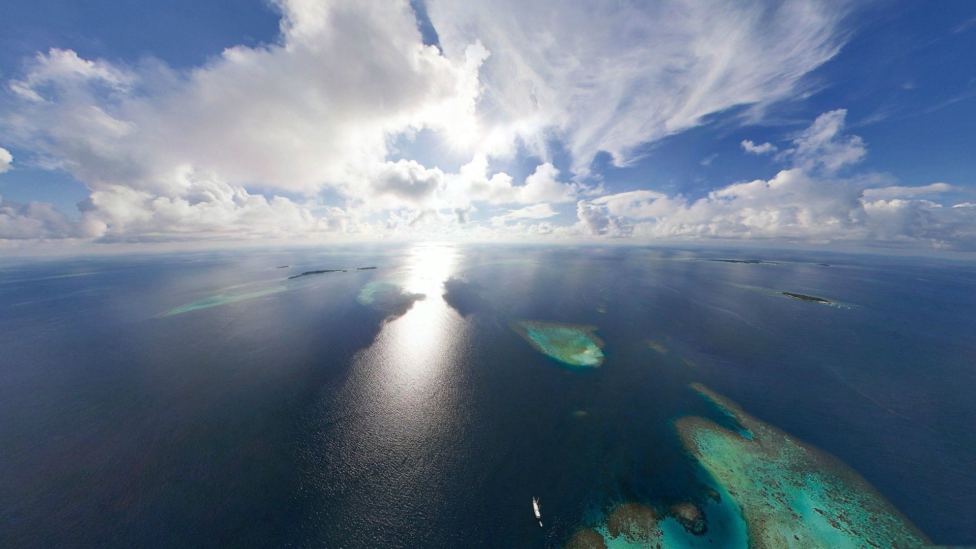 land, water, height, sun, light, clouds, movement