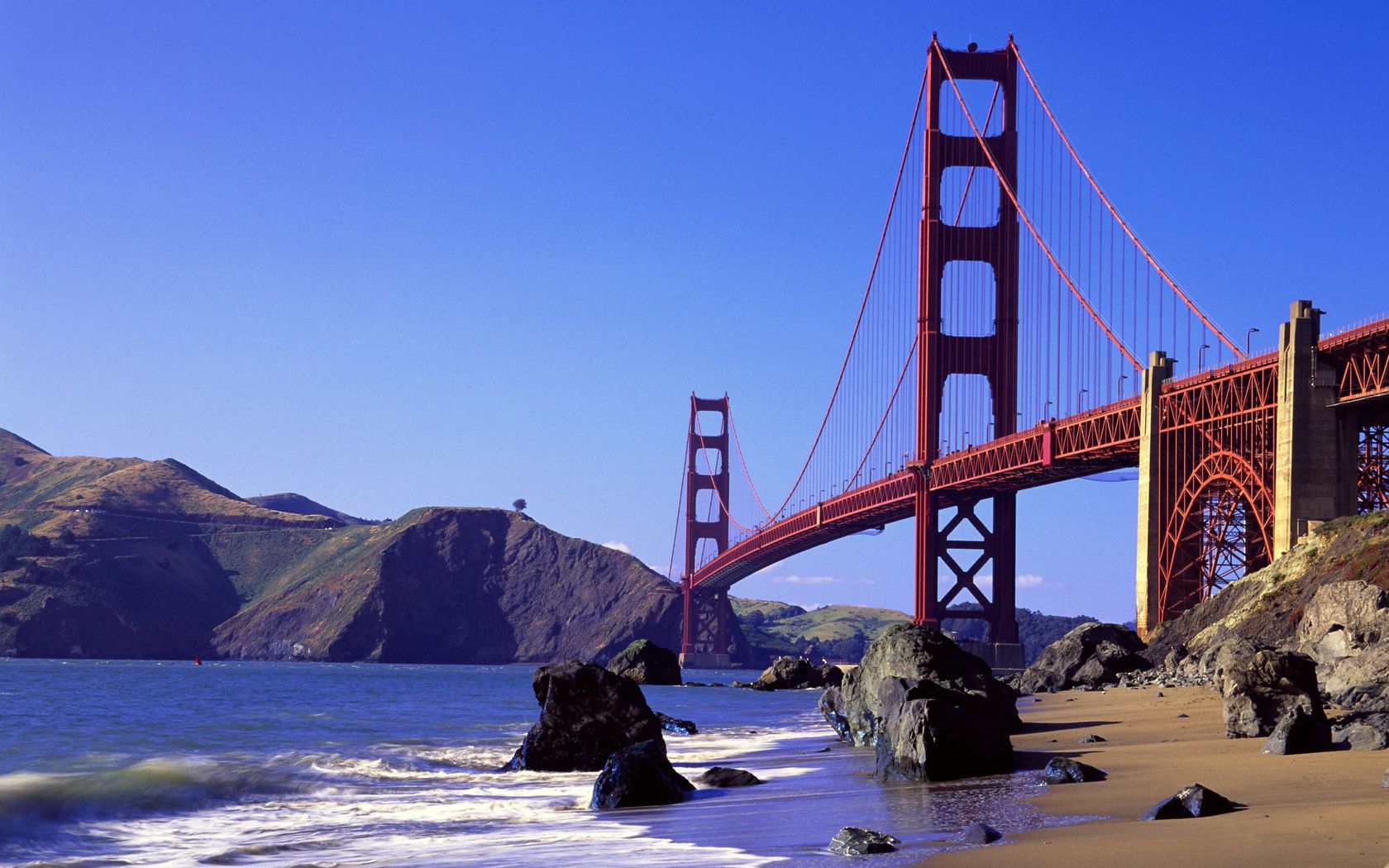 bridge, ocean, california, waves, rocks, blue sky, distance