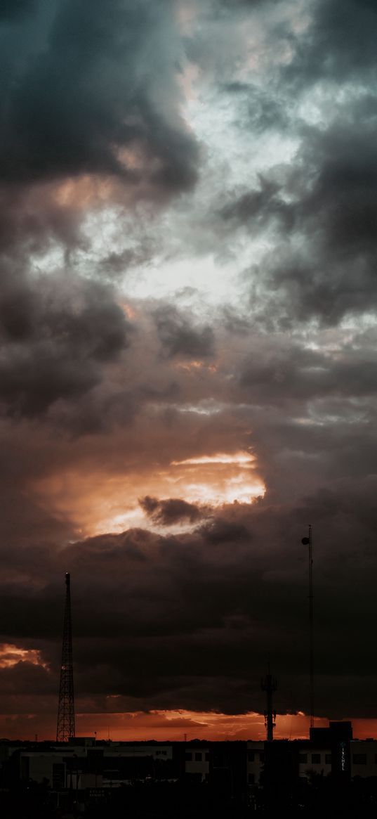 towers, houses, city, clouds, storm, darkness, sunset