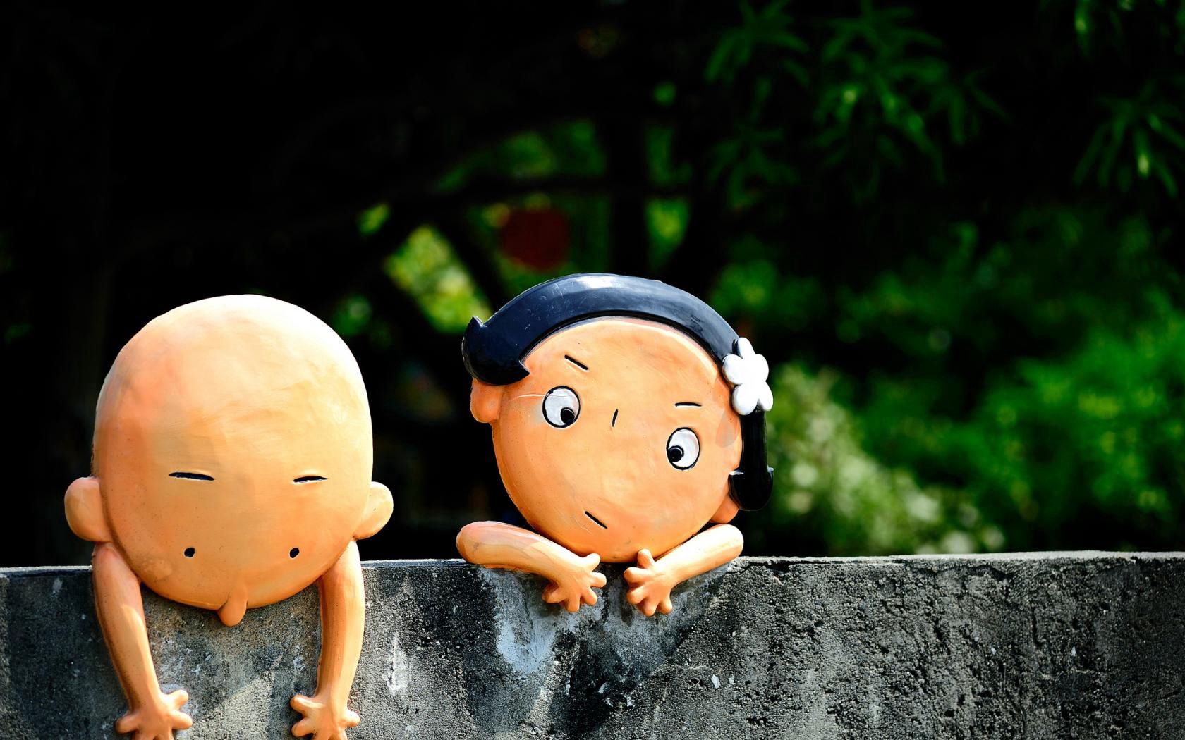 men, figurines, boy, girl, close-up, stone, green