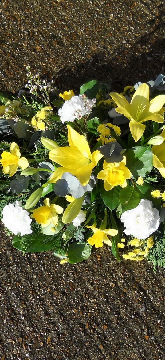 carnations, lilies, daffodils, lisianthus russell, freesia, composition, soil, shade