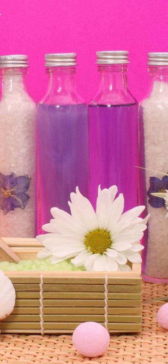 towels, lotions, stones, flowers, aromatherapy