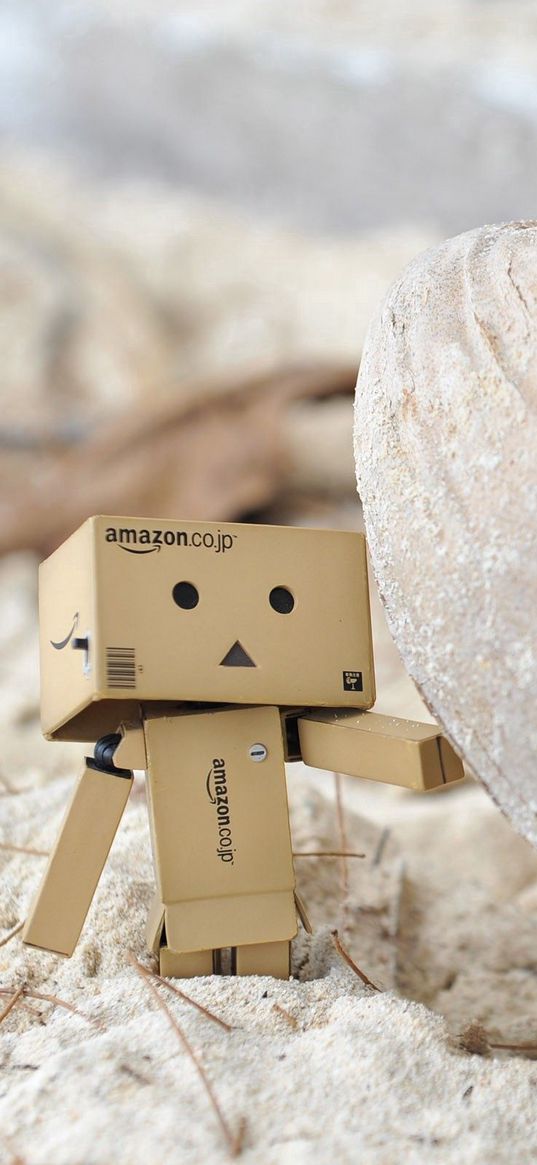 danboard, cardboard robot, sand, stone