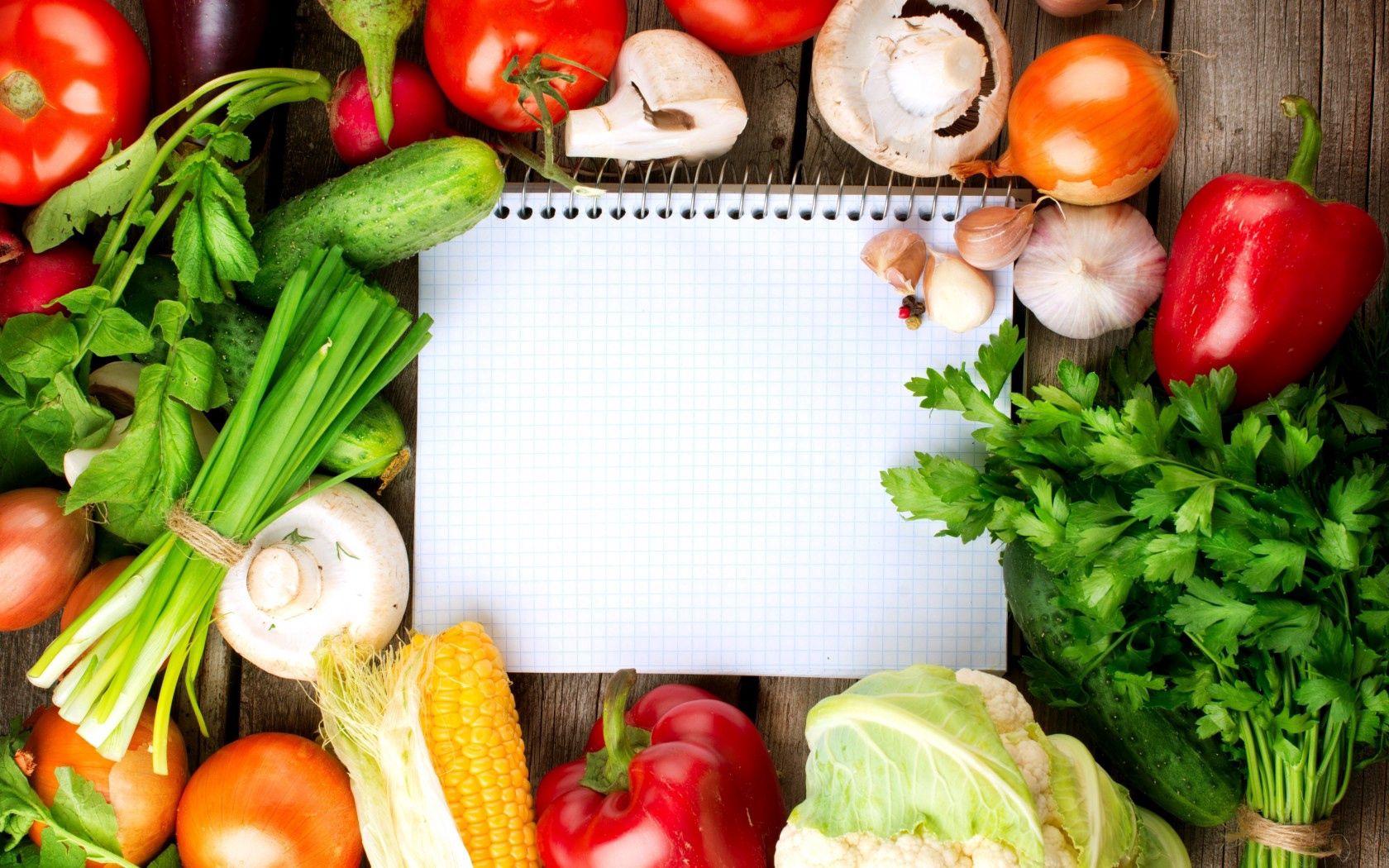 notebook, vegetables, cauliflower, garlic, tomatoes, cucumbers, mushrooms, herbs, corn, red pepper