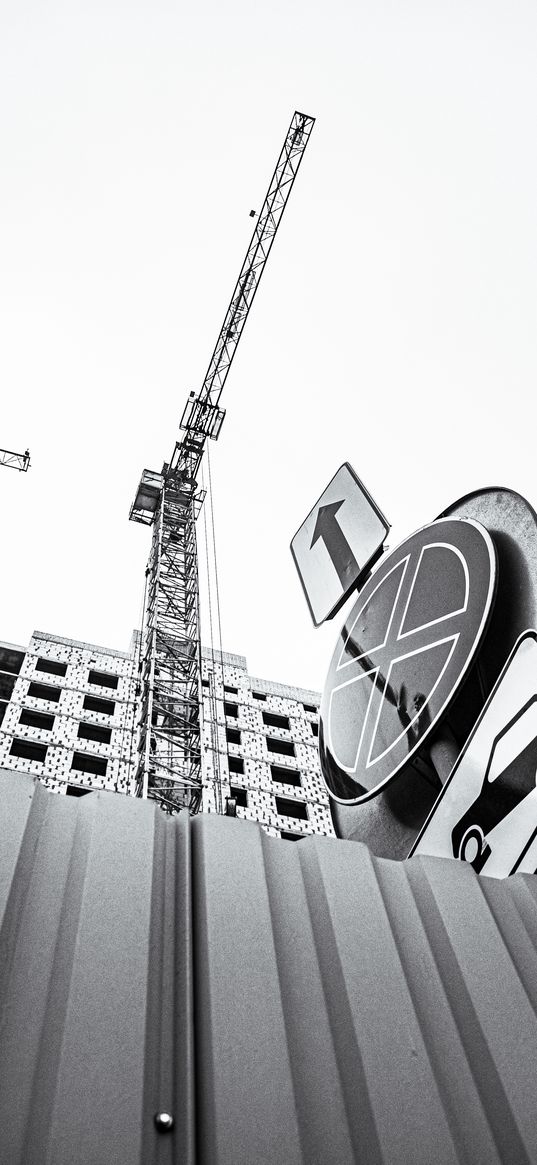 crane, construction site, house, building, road signs, fence, black and white