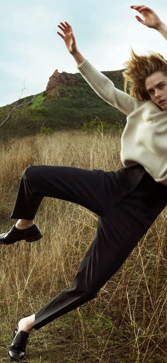 cara delevingne, model, actress, girl, jump, posing, grass, hill, sky