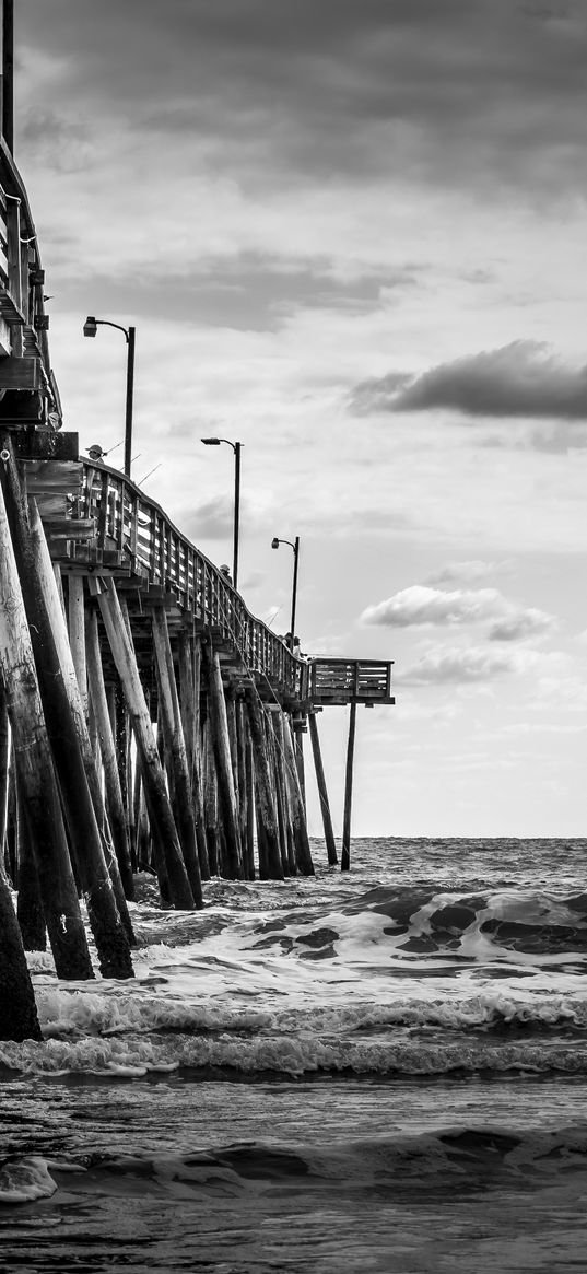 sea, pilings, pier, waves, black and white