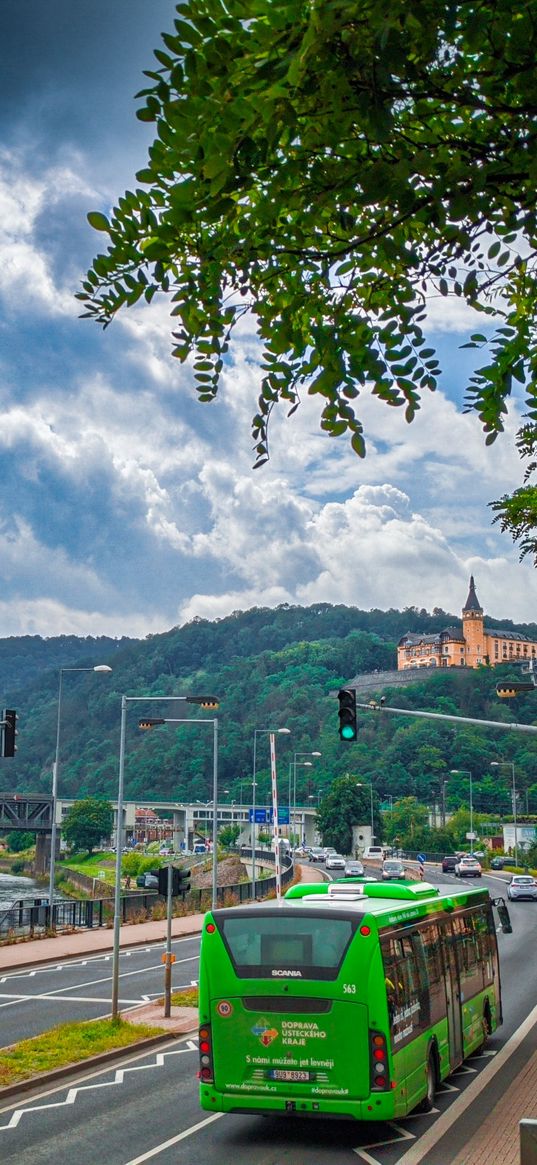 road, bus, castle, forest, sky