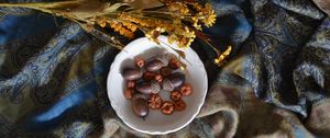 Preview wallpaper acorns, plate, flowers, cloth