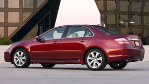 Preview wallpaper acura, rl, 2008, red, side view, style, cars, buildings, lantern, asphalt