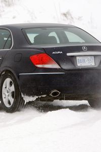Preview wallpaper acura, rl, black, rear view, cars, snow, style, movement