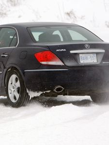 Preview wallpaper acura, rl, black, rear view, cars, snow, style, movement