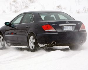 Preview wallpaper acura, rl, black, rear view, cars, snow, style, movement