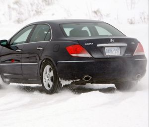 Preview wallpaper acura, rl, black, rear view, cars, snow, style, movement