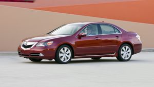 Preview wallpaper acura, rl, red, side view, auto, style, movement, building