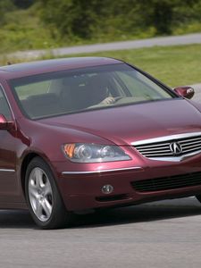 Preview wallpaper acura, rl, sedan, red, front view, style, cars, grass, trees, asphalt