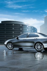Preview wallpaper acura, tsx, 2006, metallic gray, side view, style, cars, reflection, wet asphalt, buildings, clouds