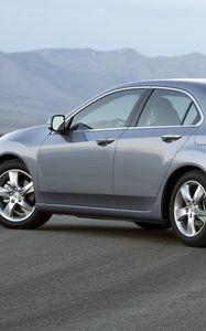 Preview wallpaper acura, tsx, 2010, metalliik gray, side view, style, cars, mountains, asphalt, fog