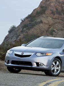 Preview wallpaper acura, tsx, 2010, blue, front view, style, cars, shrubs, rock, sky, asphalt