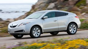Preview wallpaper acura, zdx, 2009, white, side view, style, cars, speed, flowers, grass, sea, rock