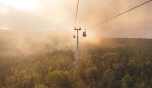 Preview wallpaper aerial lift, cable car, fog, trees, clouds