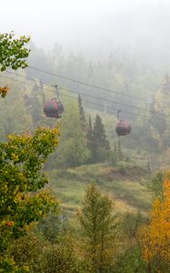 Preview wallpaper aerial lift, trees, autumn, fog, nature