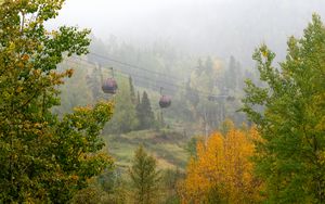 Preview wallpaper aerial lift, trees, autumn, fog, nature