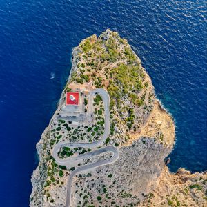 Preview wallpaper aerial view, island, road, relief, sea