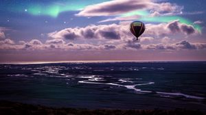 Preview wallpaper air balloon, ocean, aurora borealis, coast, clouds