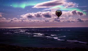 Preview wallpaper air balloon, ocean, aurora borealis, coast, clouds