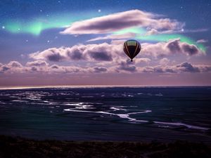 Preview wallpaper air balloon, ocean, aurora borealis, coast, clouds