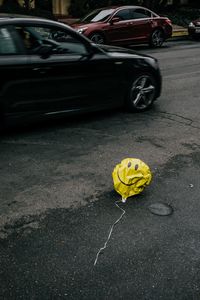 Preview wallpaper air balloon, smile, sad, road, asphalt, cars