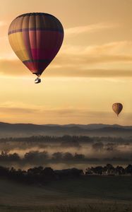 Preview wallpaper air balloons, field, fog, sky, sunset