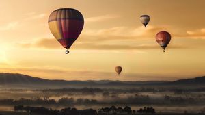 Preview wallpaper air balloons, field, fog, sky, sunset