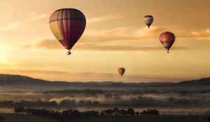 Preview wallpaper air balloons, field, fog, sky, sunset