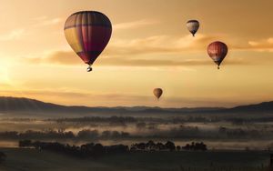 Preview wallpaper air balloons, field, fog, sky, sunset