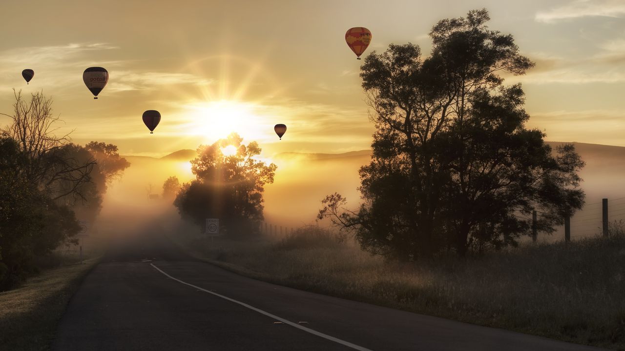 Wallpaper air balloons, road, fog, sunlight, sunset